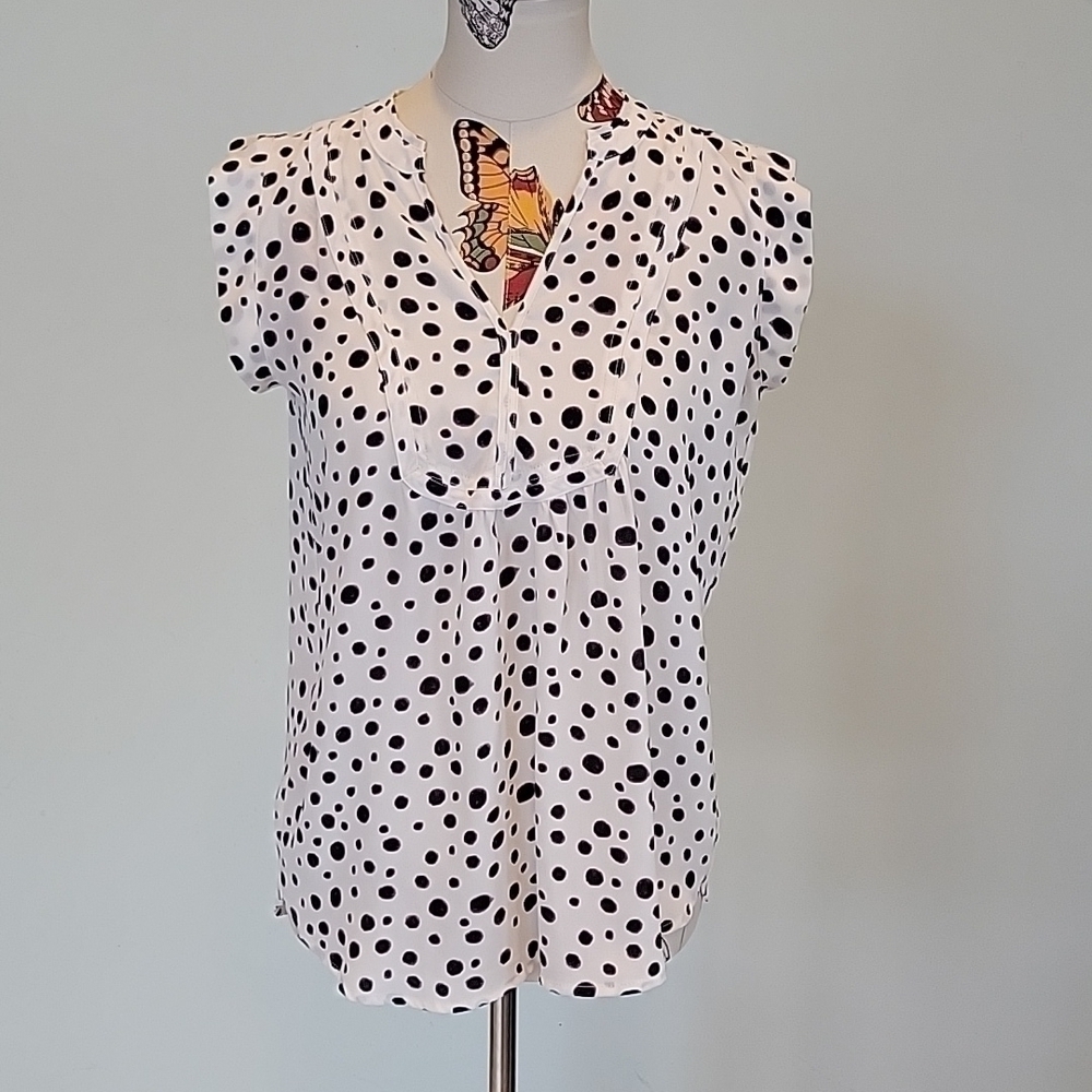 Loft black and white spotted sleeveless blouse.  Size is Small
